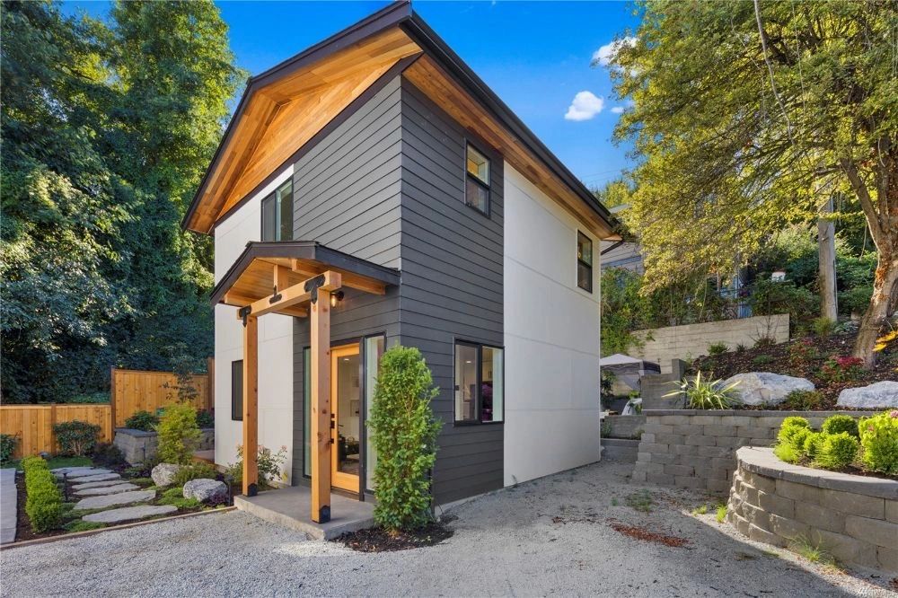 Modern home exterior with wood soffit and new siding