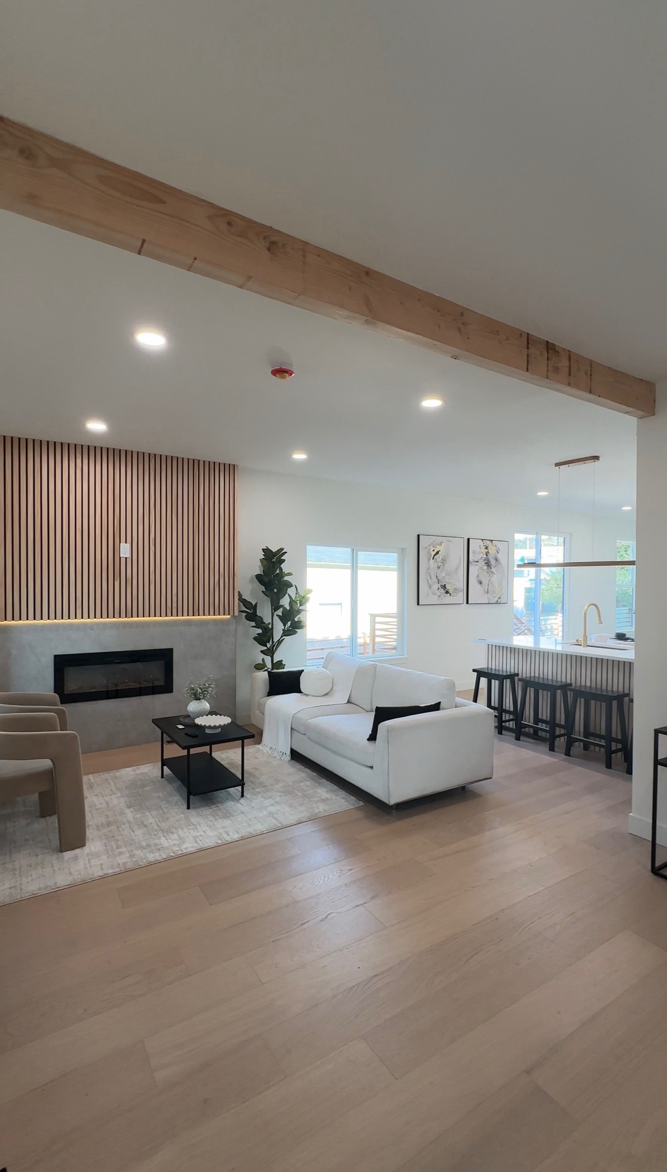 Open-plan living room and kitchen after a full home renovation